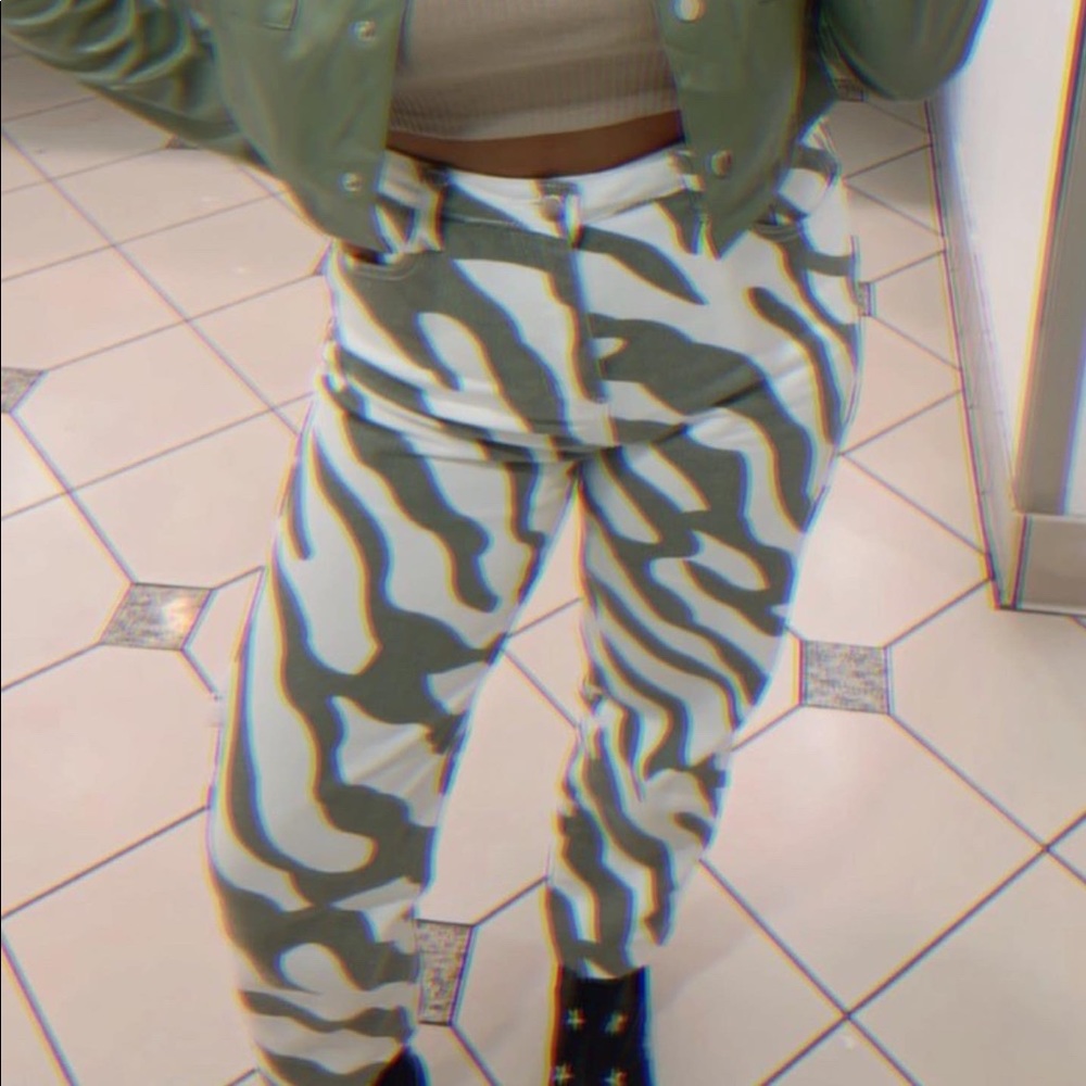 white and green zebra jeans